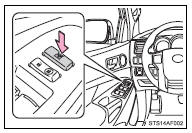 Press the switch down to lock passenger window switches.