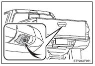 The camera for the rear view monitor system is located as shown in the illustration.