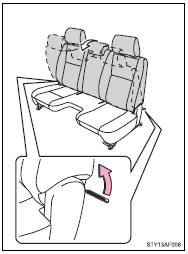 Pull the seatback lock release lever and fold down the seatback.