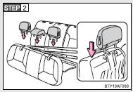 Attach the head restraints to the holders located on the back sides of the bottom