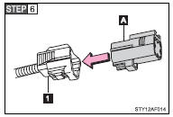 Attach the connector cover (Gray) to the tailgate wire harness connector (White).