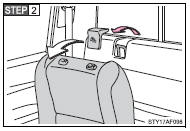 Swing the seatback forward slightly (→P. 47) and remove the anchor bracket cover.