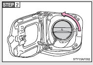 Turn the fuel tank cap slowly to open.