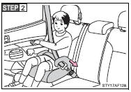 Sit the child in the booster seat.