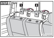 Swing the seatback forward slightly (→P. 48) and remove the anchor bracket covers.