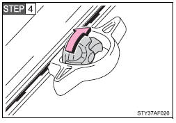 Tighten the thumb wheel in a clockwise motion until the clutch mechanism ratchets.