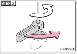 Loosen the antenna with the wrench and remove it.