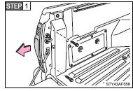 Remove the bolts and rear combination assembly.