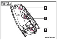 Turn the bulb bases counterclockwise.