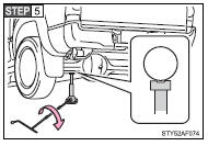 Raise the vehicle until the tire is slightly raised off the ground.