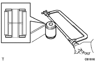 (a) Fix the spring in a vise.