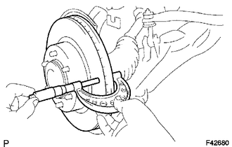 (a) Using a micrometer, measure the disc thickness.