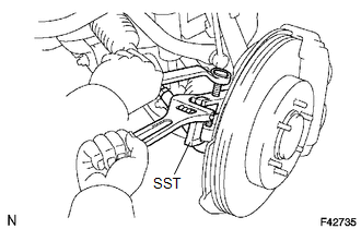 (a) Remove the cotter pin and nut.