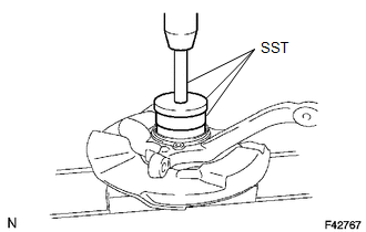 (a) Using SST and a press, install a new front axle hub oil seal.