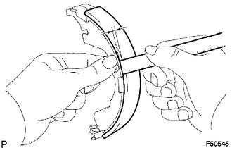 (a) Using a ruler, measure the thickness of the shoe lining.