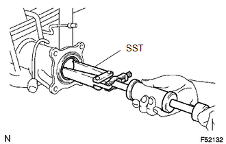 (a) Using SST, remove the oil seal.