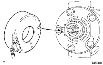 (a) Secure the cooler compressor assembly in a vise between aluminum plates.