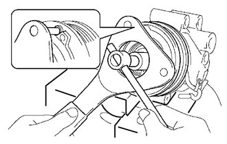 (a) Secure the cooler compressor assembly in a vise between aluminum plates.