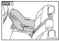 Place the child seat on the rear seat facing the rear of the vehicle.
